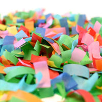 Biodegradable paper confetti falling in slow cascade